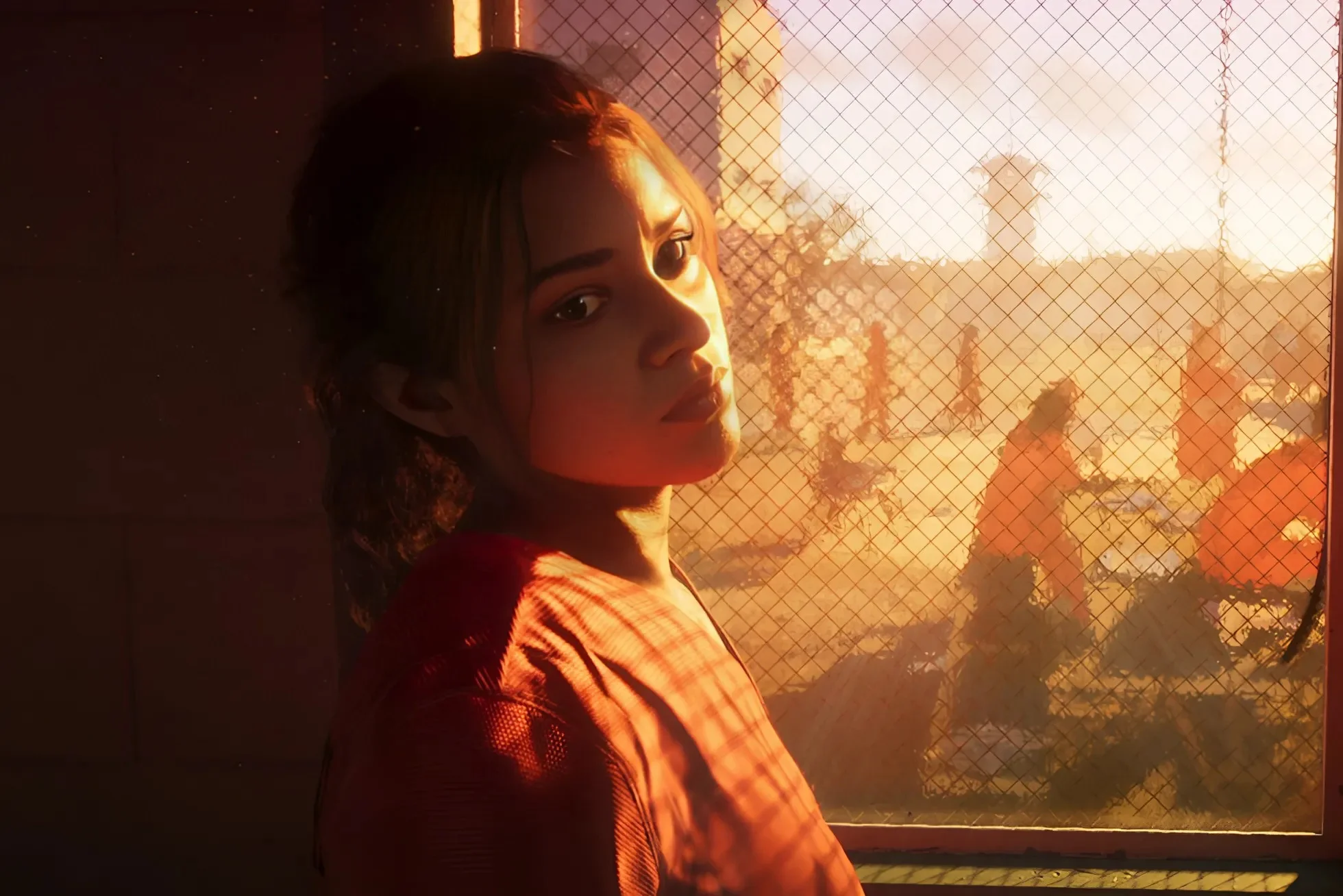 Lucia is looking out of her cell window.